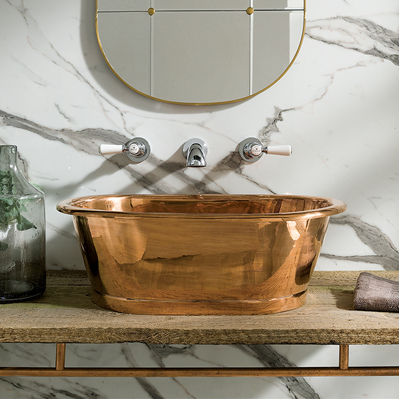 unlacquered copper countertop basin with chrome tap