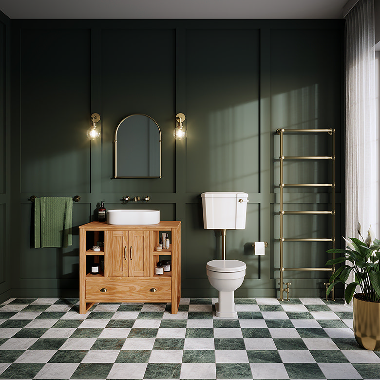 Green and white chequerboard bathroom floor tiles paired with dark green panelled walls and traditional bathroom fittings
