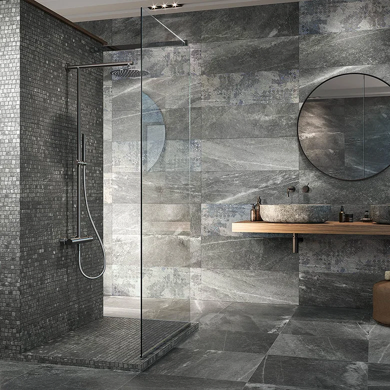 grey large format stone effect tiles in bathroom