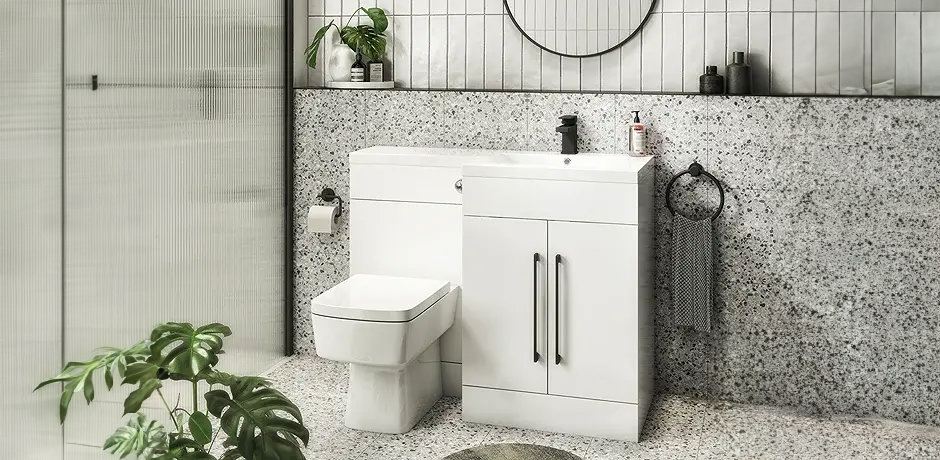 Contemporary bathroom with white combination unit and terrazzo tiles