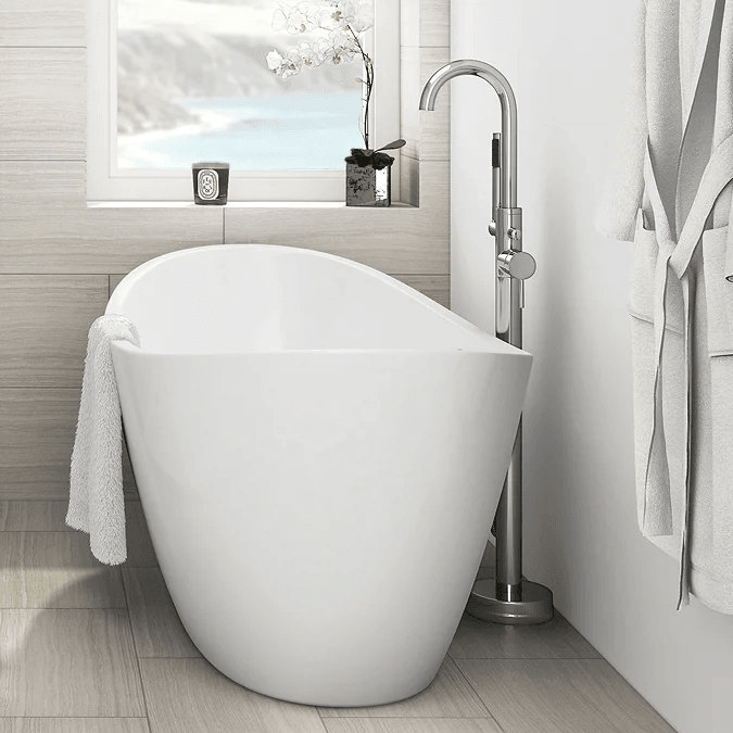 modern freestanding bath with chrome tap
