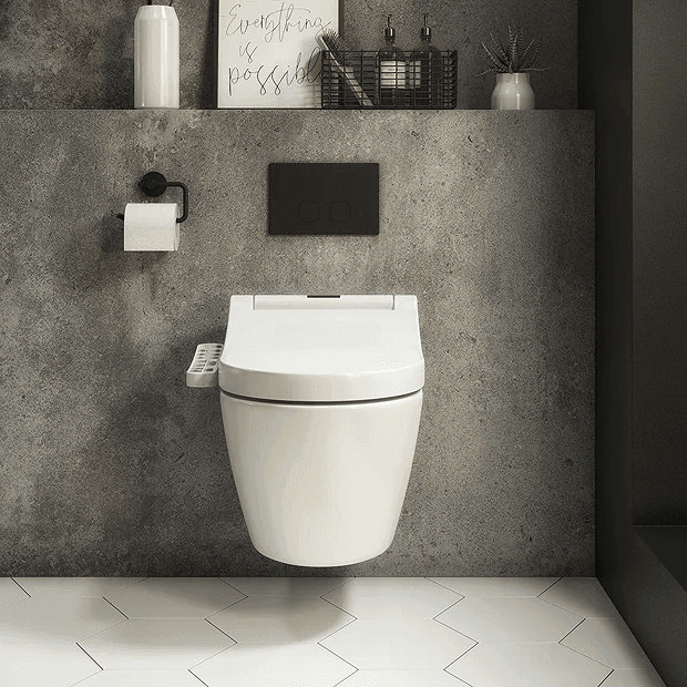 Wall mount smart toilet on concrete wall with black flush plate