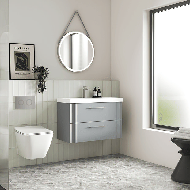 Grey wall hung vanity unit in light beige bathroom