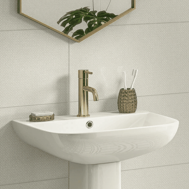 Brass basin tap with white tiles