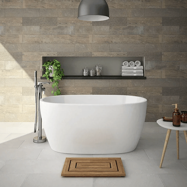 Modern freestanding bath with freestanding chrome tap
