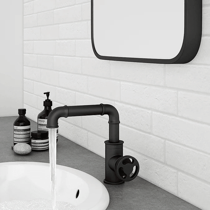 Industrial style black tap on grey countertop