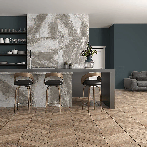 Wood effect floor tiles in industrial style open plan kitchen