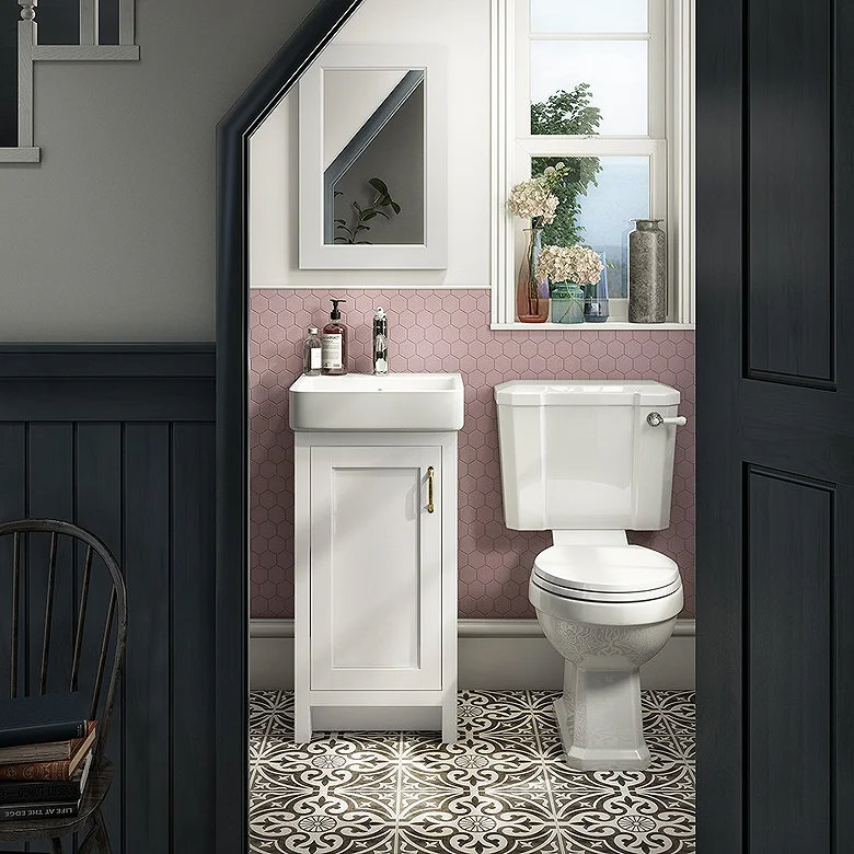downstairs toilet installed under stairs