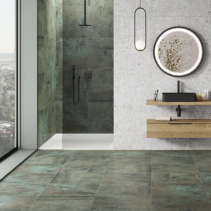 walk-in shower with green metal oxide effect floor tiles