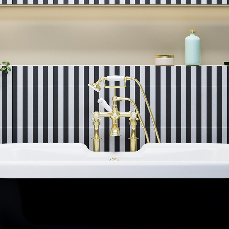 traditional brushed brass bath shower mixer tap with handset on freestanding bath