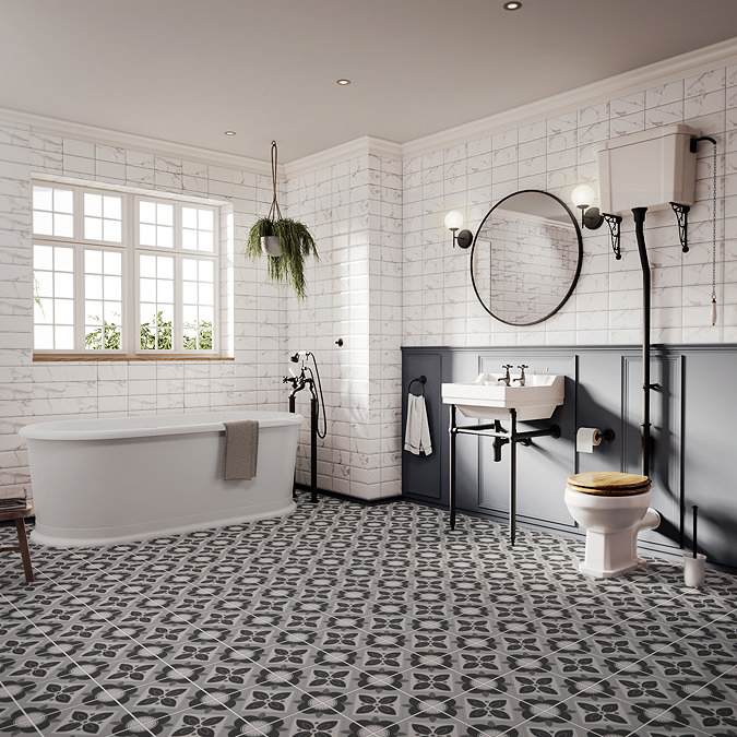 vintage style bathroom with grey geometric patterned floor tiles
