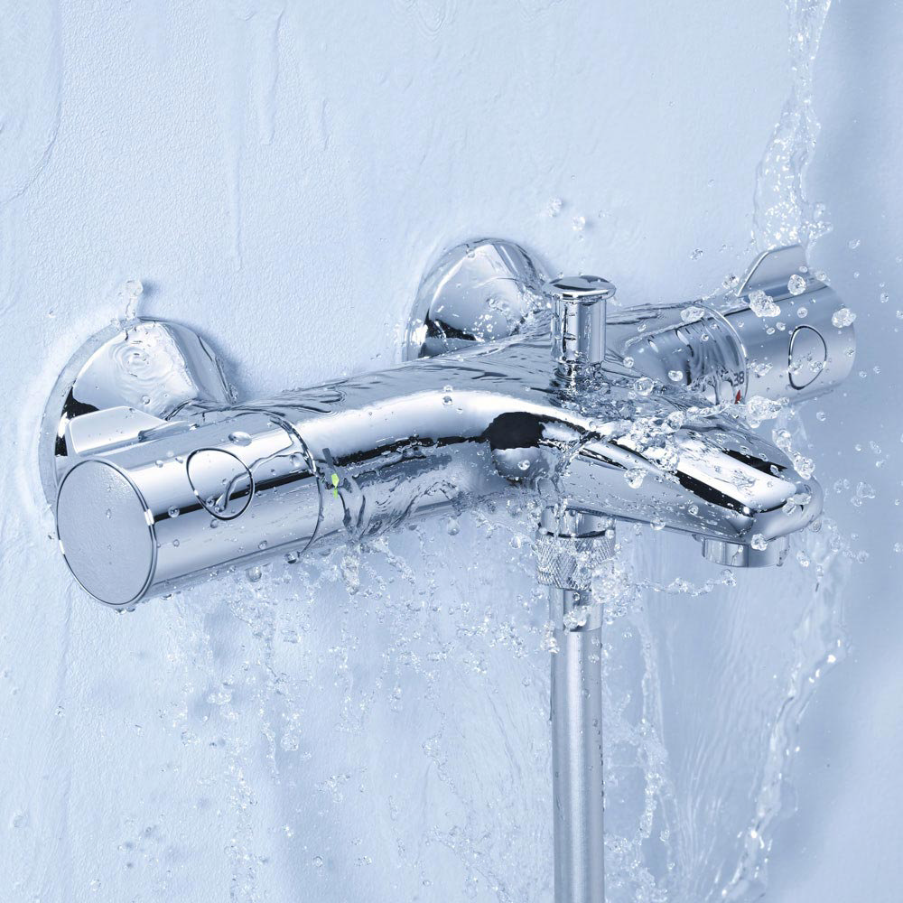 Grohe Grohtherm 800 Thermostatic Bath Shower Mixer - 34569000 - Close up image of chrome bath shower mixer in action