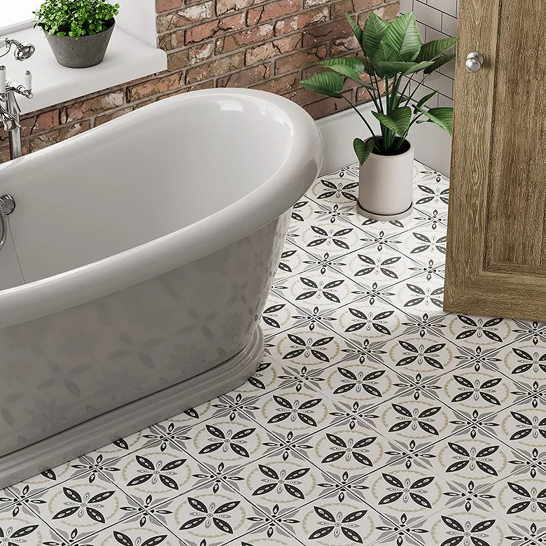 Victorian patterned tiles and free standing bath