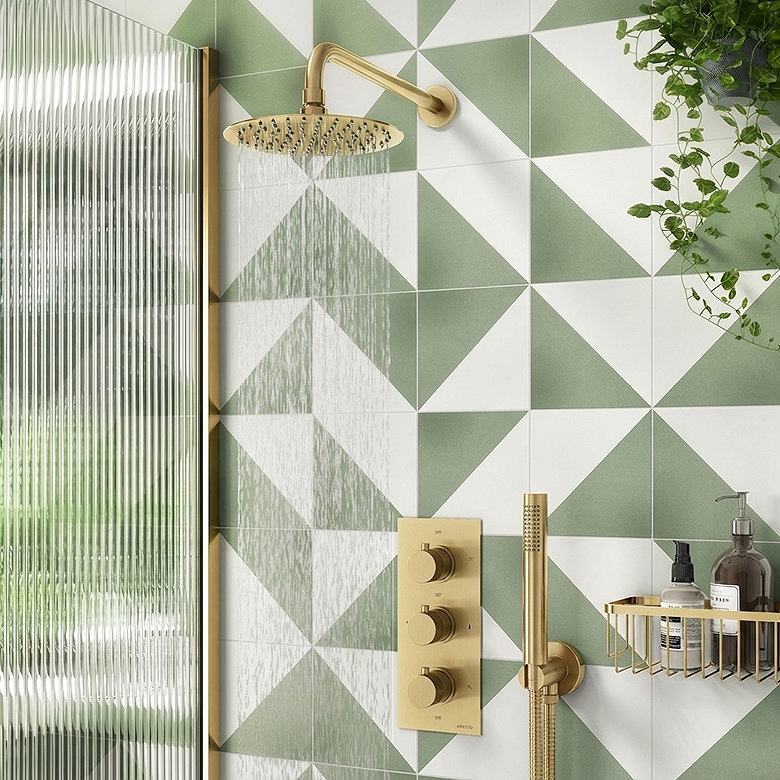 stylish brushed brass shower in colourful bathroom