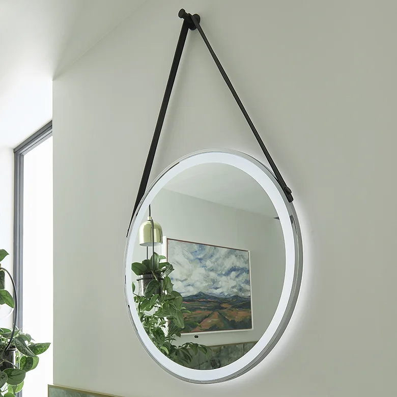 hanging strap bathroom wall mirror reflecting artwork