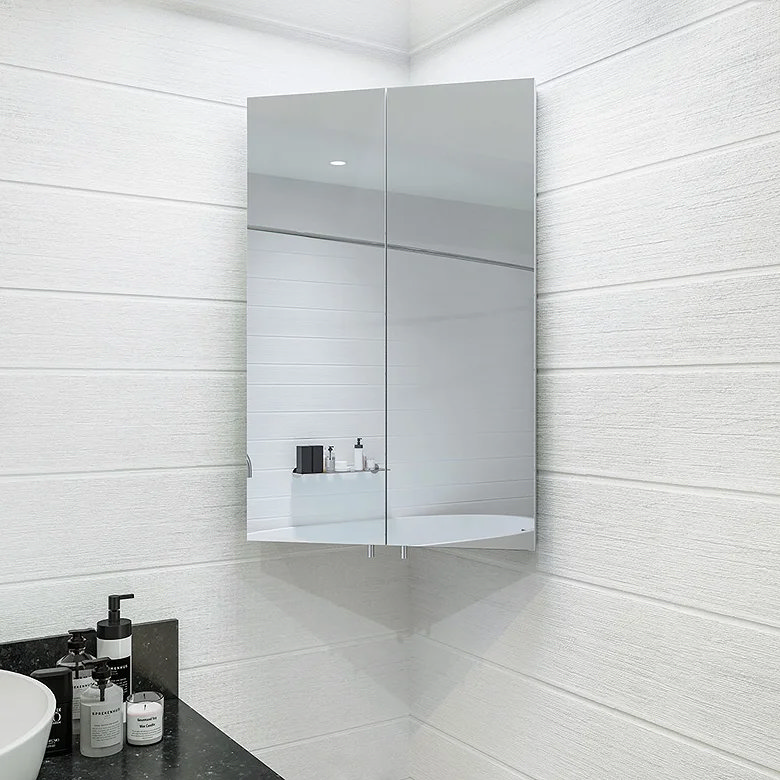 space saving mirror cabinet in corner of bathroom