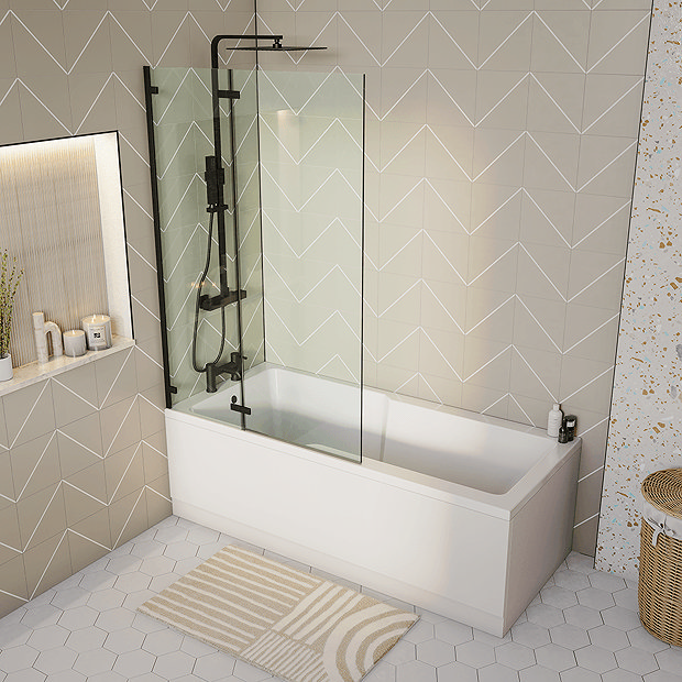Beige and white wall tiles behind black shower bath