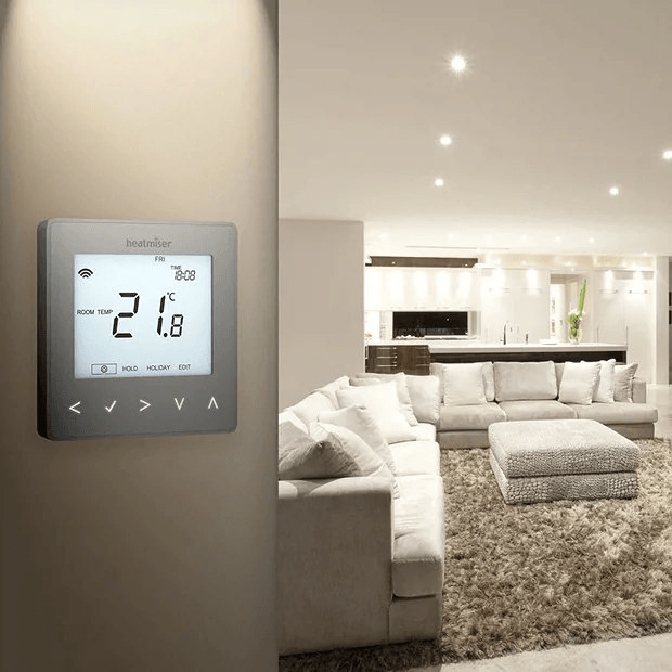 Smart thermostat in cream living room 