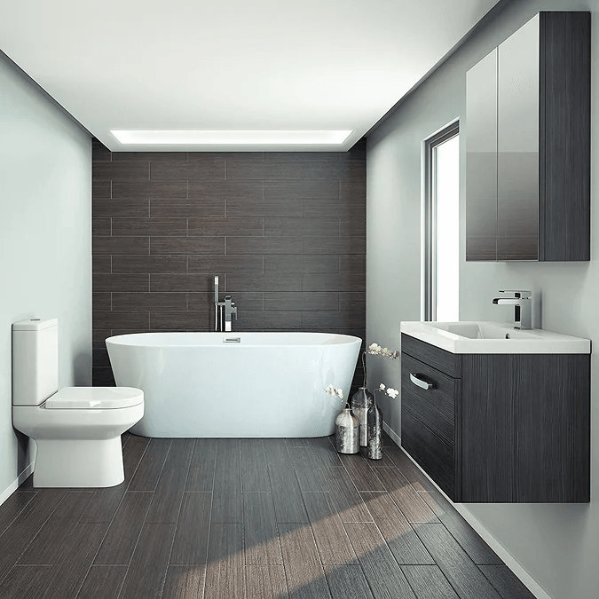 Large bathroom with freestanding bath and black furniture