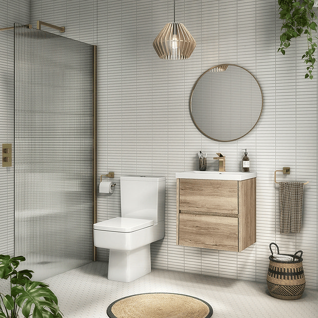 Wooden vanity unit in white bathroom