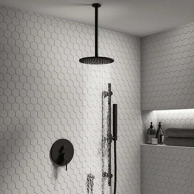 Black ceiling mount rainfall shower with white hexagonal tiles
