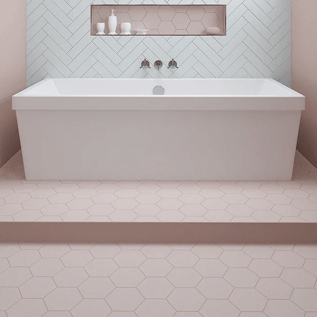 Pink tiles with large bath