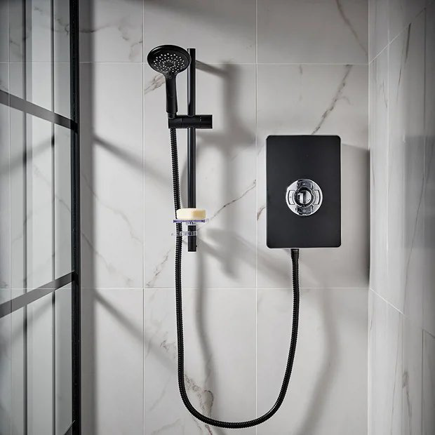 Matt black electric shower on white tiles