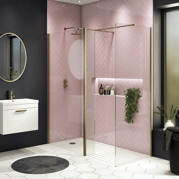 Walk in shower with pink tiles