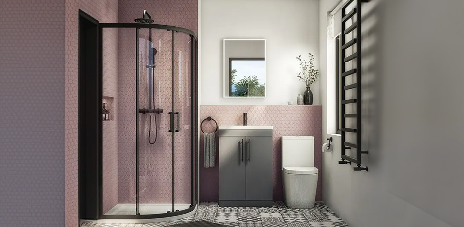 Small bathroom with black shower and pink tiles