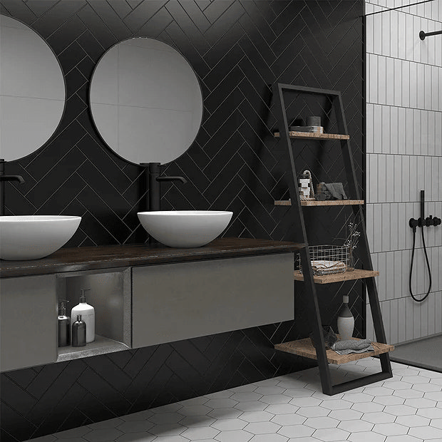 Black herringbone tiles in modern bathroom