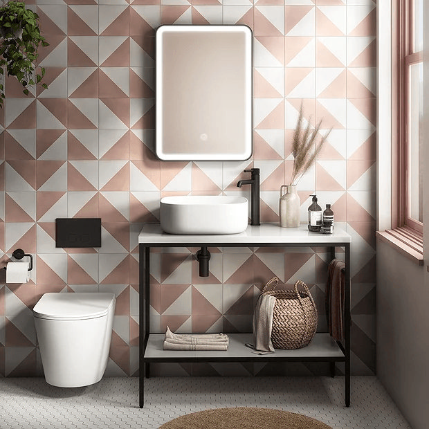 Pink and white tiles in small bathroom