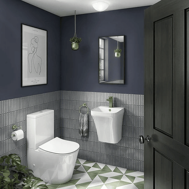 Grey tiles in small blue bathroom