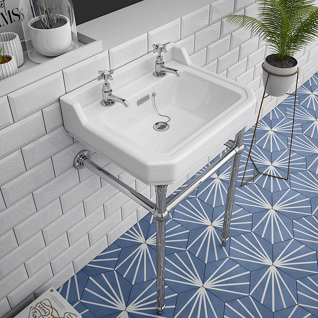 White and chrome washstand on blue and white tiles