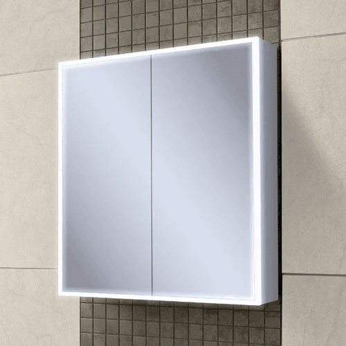 Light up mirrored cabined on brown and cream tiles