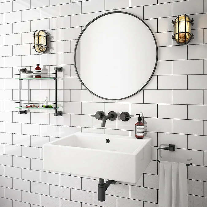 White wall mount sink with black taps