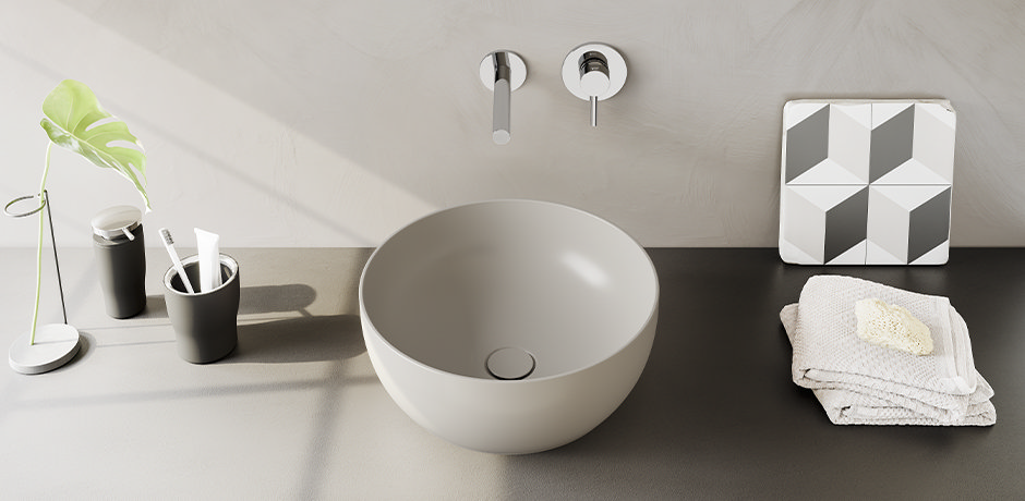 Round basin with wall mount tap