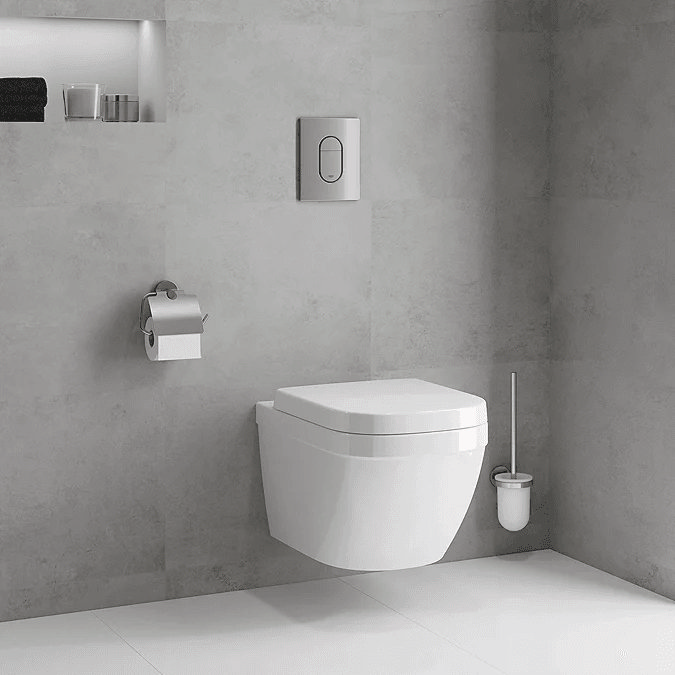 Wall hung toilet on grey tiles wall