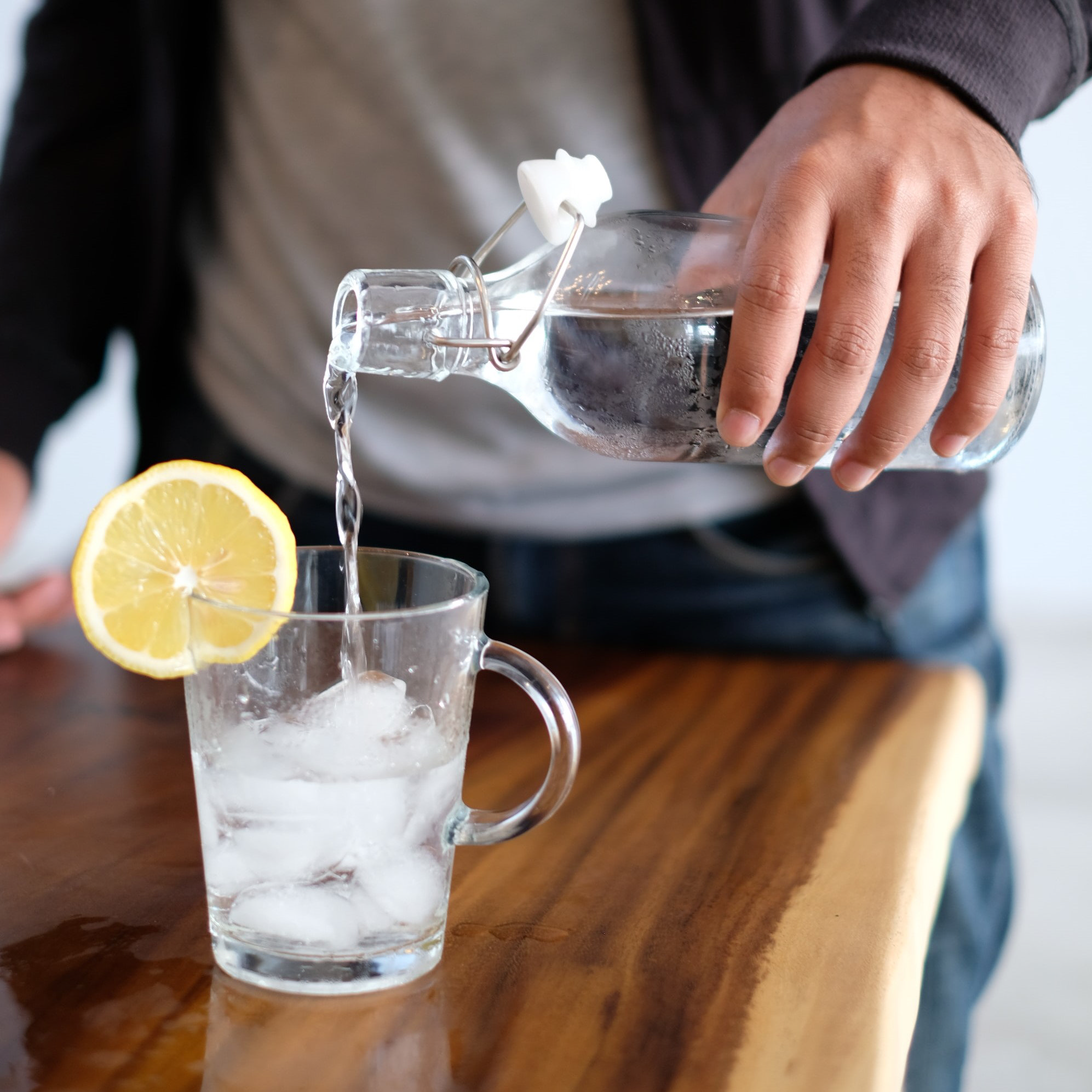 Pouring water into glass