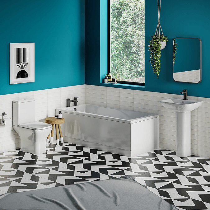 Large bathroom with black and white floor tiles and bright blue walls