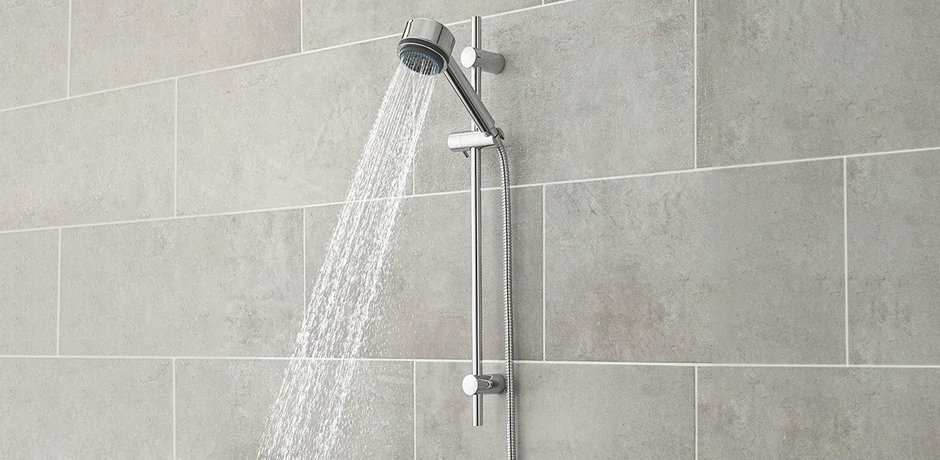 Chrome shower on grey wall