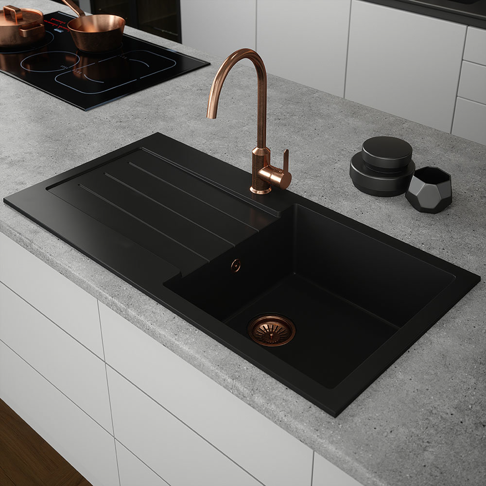 black composite sink with copper taps