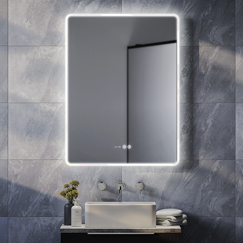 Illuminated LED bathroom mirror above a countertop basin, adding soft ambient lighting to a spa-style bathroom