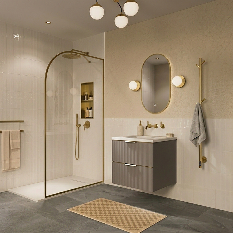 Brushed brass wall-mounted towel bar with grey towel in a modern spa-style bathroom