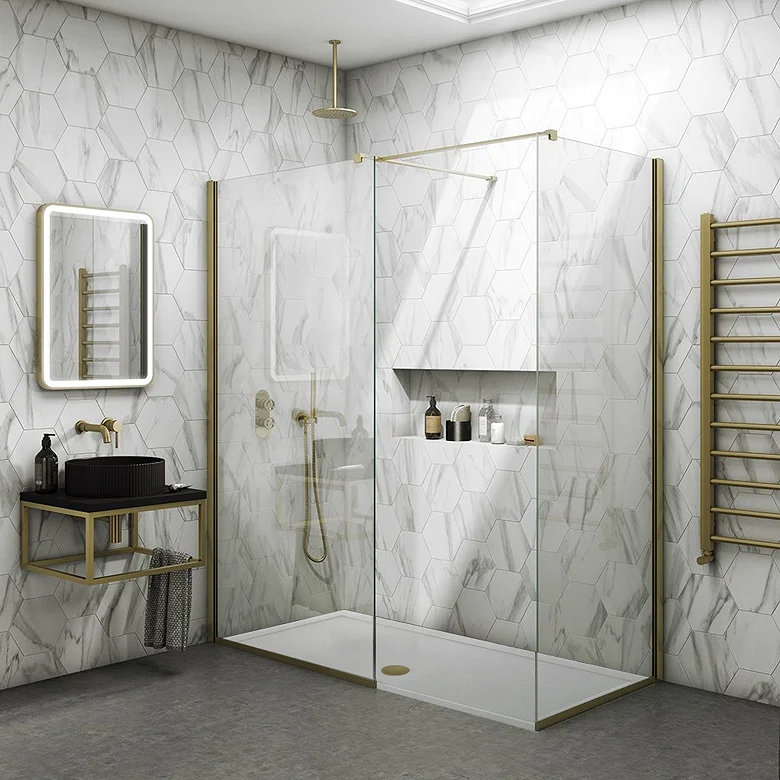 Walk-in shower enclosure with rainfall shower, marble-effect tiles and brushed brass details for a spa-like bathroom