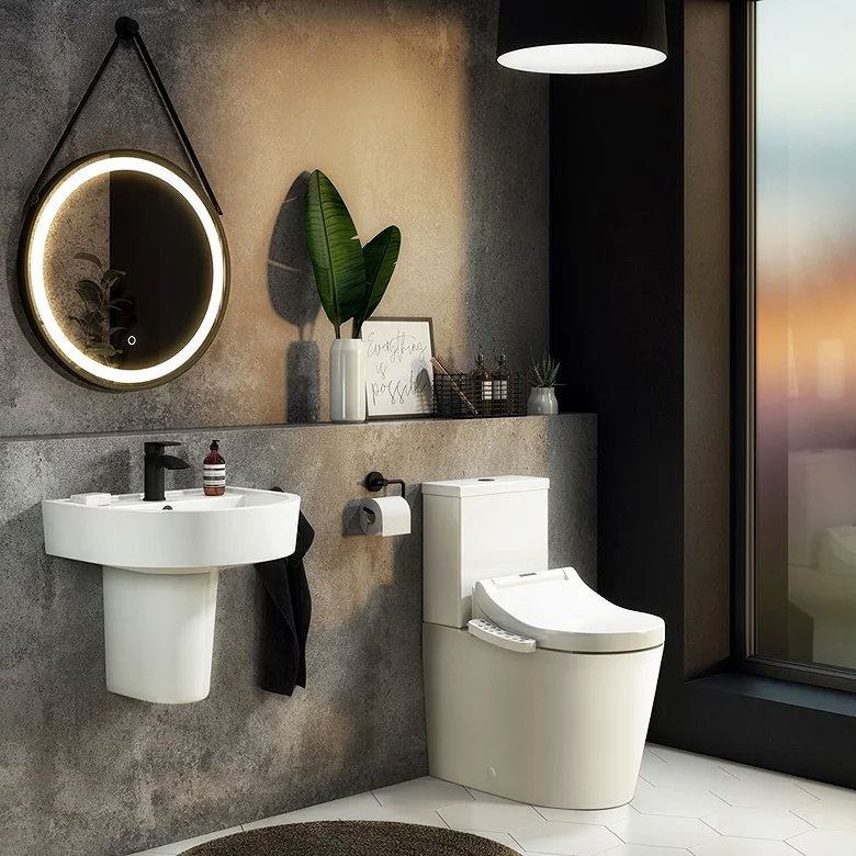 Smart toilet with bidet functions in a modern spa-style bathroom with an illuminated round mirror