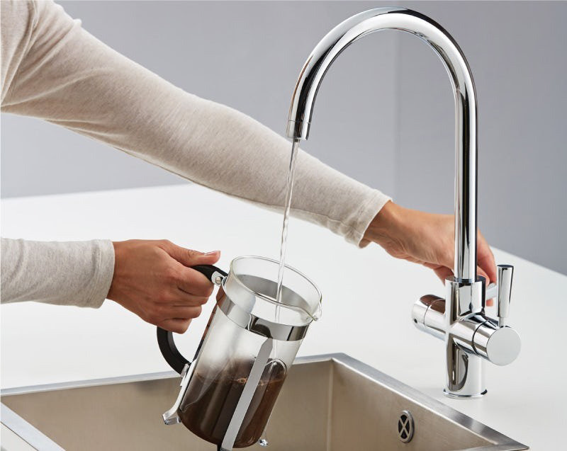 Kitchen with a boiling water tap