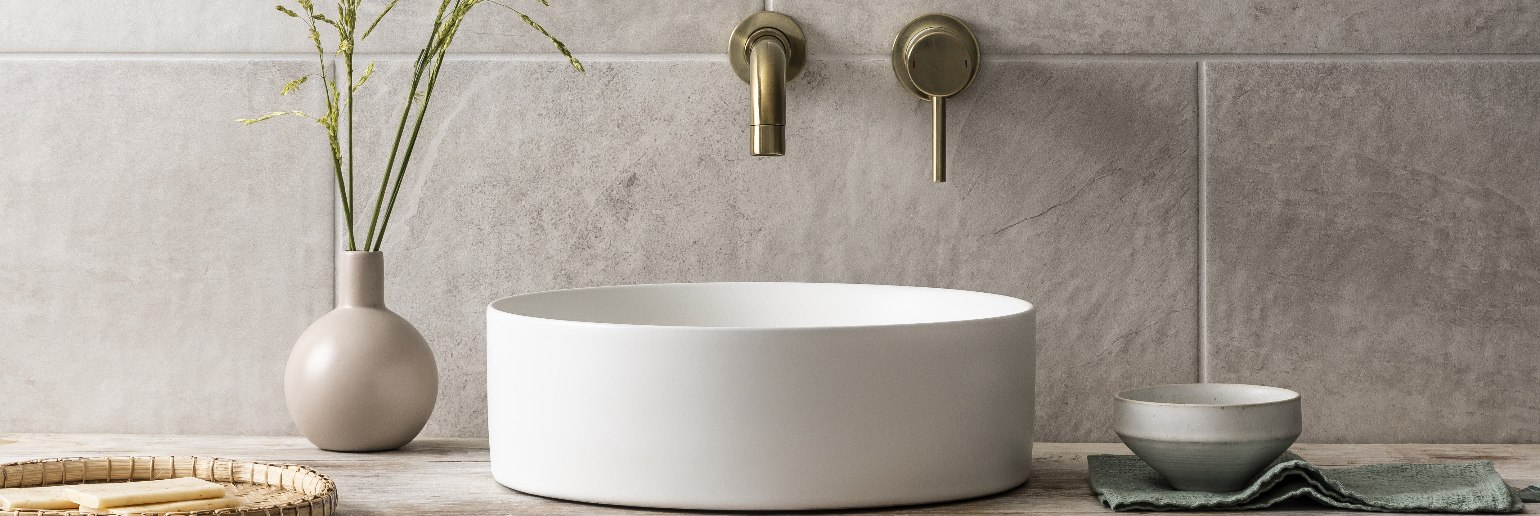 Modern countertop basin in a round design with a smooth white finish