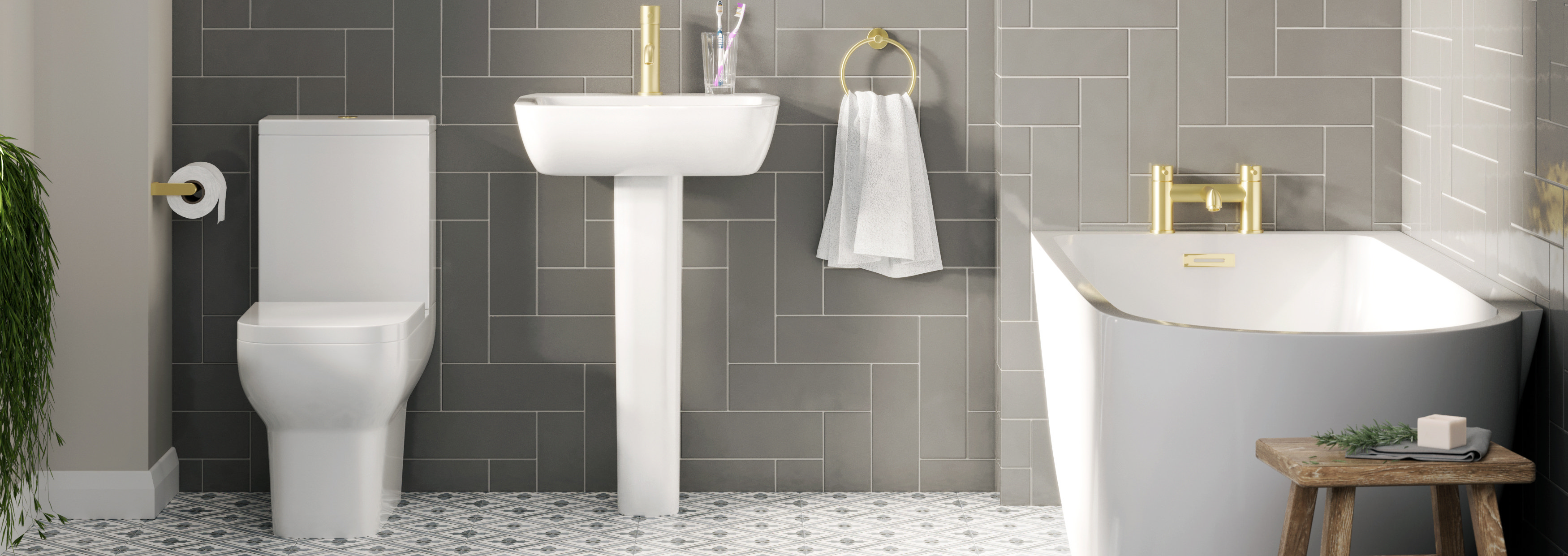 Modern bathroom suite featuring a freestanding white bathtub