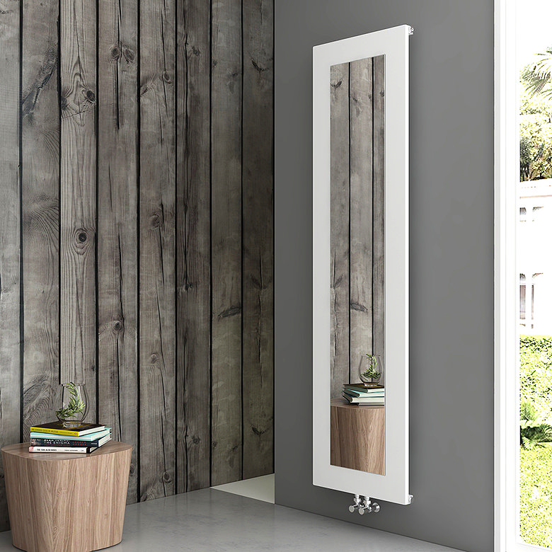 Tall white designer radiator with an integrated full-length mirror mounted on a grey wall