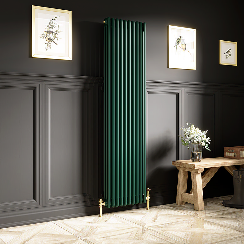 Tall green vertical column radiator mounted on a dark panelled wall in a stylish hallway